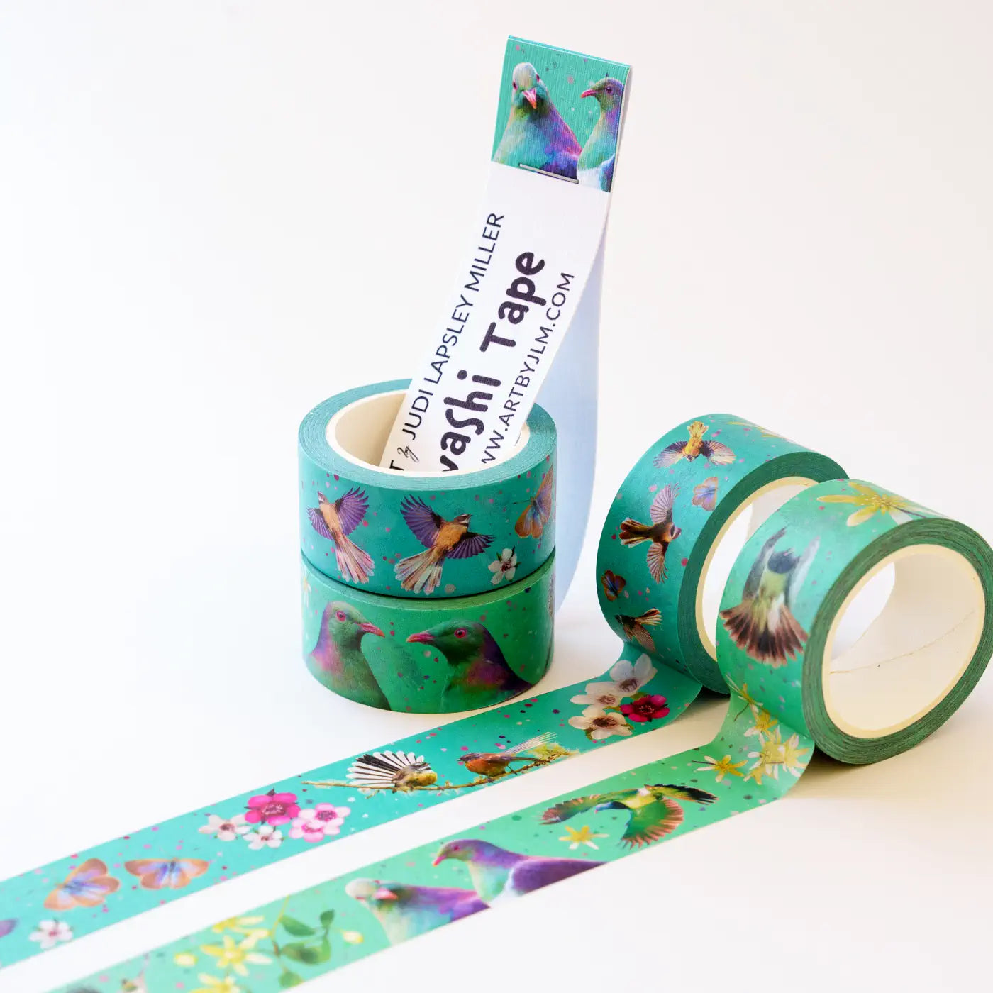 Piwakawaka fantail and kereru washi tapes with blue-green and green-blue backgrounds